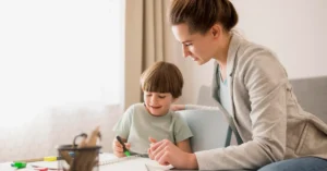 side-view-tutor-teaching-child-home (1)